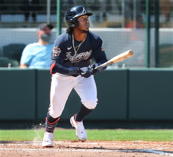 Atlanta Braves second baseman Ozzie Albies hits a solo home run against the Baltimore Orioles during the fourth inning Wednesday, March 3, 2021, at CoolToday Park in North Port, Fla. (Curtis Compton / Curtis.Compton@ajc.com)