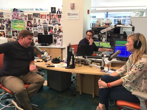 Jeff Dauler and Jenn Hobby with Al Reynolds, the producer, in the middle.