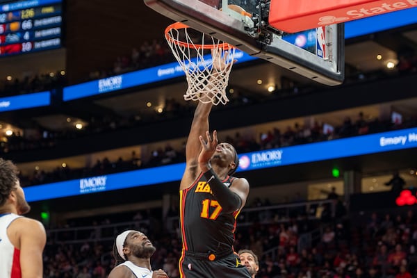 Atlanta Hawks forward Onyeka Okongwu (17) shoots a basket during the first half of an NBA basketball game against the Detroit Pistons, Sunday, Feb. 23, 2025, in Atlanta. (AP Photo/Erik Rank)