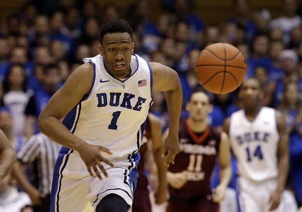 Duke's Jabari Parker (1) chases the ball during the first half of an NCAA college basketball game against Virginia Tech in Durham, N.C., Tuesday, Feb. 25, 2014. (AP Photo/Gerry Broome) Jabari Parker probably won't be a Hawk next season. (Gerry Broome/AP)