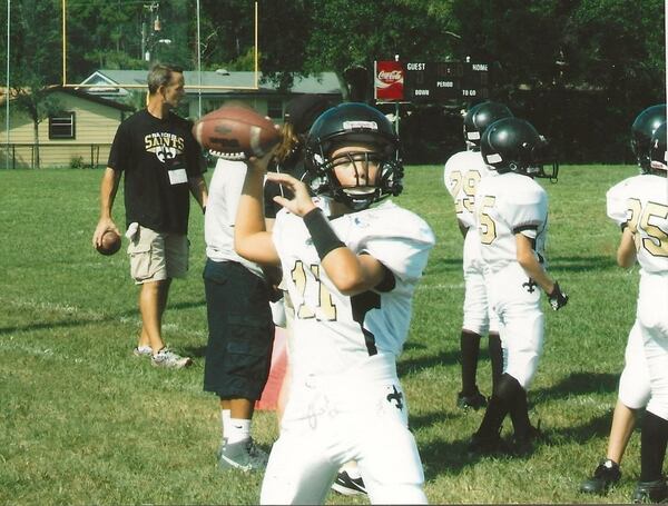 Carson Beck's father (back left) Chris Beck coached his son (foreground) for 10 years while he played for the Pablo Creek Saints and other teams in the Duval County parks and recreation league while growing up in Jacksonville. (Family photo provided by Chris Beck)