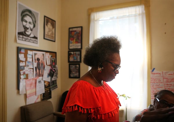 Marilynn B. Winn, director of two non-profits that advocate for formerly incarcerated people, works with women during a meeting at her office at Women on the Rise on Wednesday, August 23, 2018, in East Point. Curtis Compton/ccompton@ajc.com