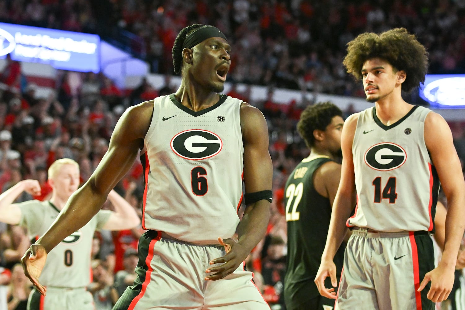 Georgia center Somto Cyril (6) reacts after being fouled as  forward Asa Newell (14) looks on during the second half of an NCAA Basketball game Saturday, March 8, 2025 at Stegeman Coliseum in Athens. Georgia beat Vanderbilt 79-68. (Daniel Varnado/For the Atlanta Journal-Constitution)