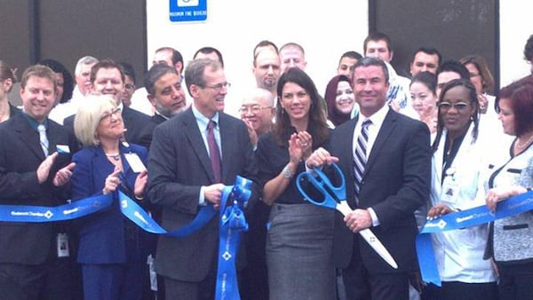 Then-U.S. Rep. Jack Kingston officiates a ribbon cutting ceremony for Confirmatrix Dec. 6, 2013, hours before attending a fundraiser for his U.S. Senate campaign orchestrated by two companies linked to Khalid Satary, a felon under a U.S. deportation order.