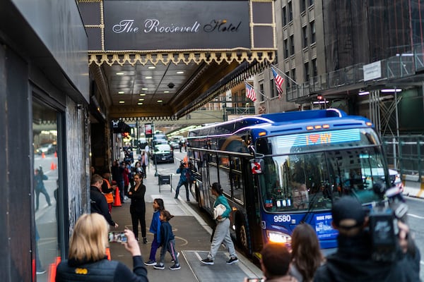 FILE - Asylum seekers arrive at the Roosevelt Hotel on Friday, May 19, 2023, in New York. (AP Photo/Eduardo Munoz Alvarez, File)