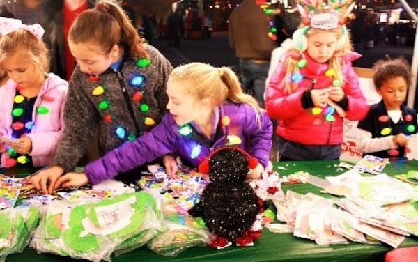 Children participate in a previous Light Up Brookhaven celebration.