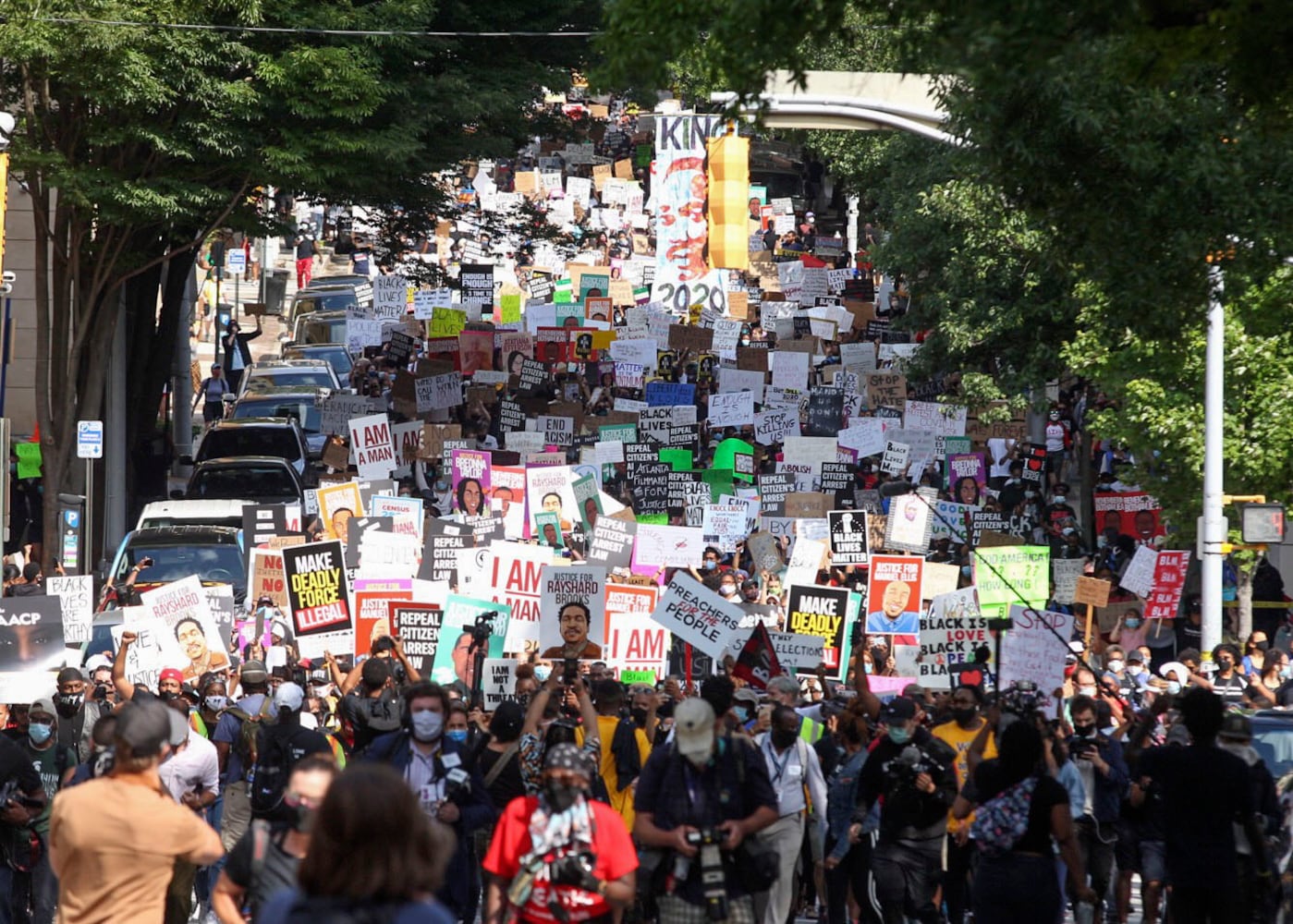 PHOTOS: Thousands march at Georgia Capitol as lawmakers return