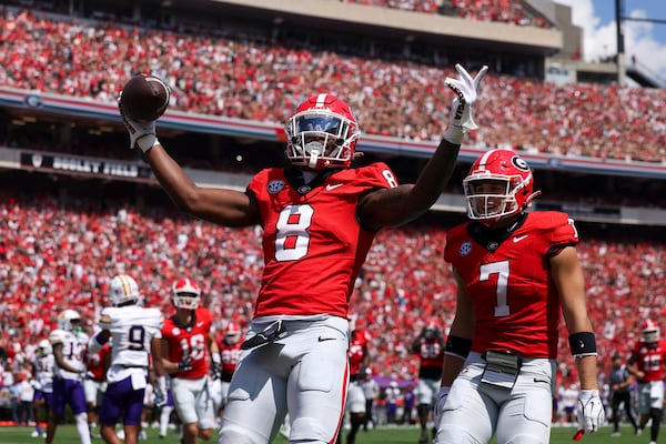 Georgia wide receiver Colbie Young (8) celebrates after scoring on a 6-yard touchdown reception during the first quarter against Tennessee Tech at Sanford Stadium, Saturday, Sept. 7, 2024, in Athens, Georgia. (Jason Getz/The Atlanta Journal-Constitution/TNS)