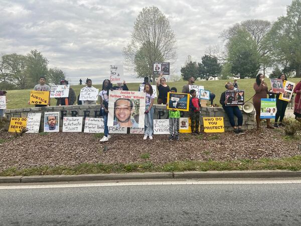 About 40 people gathered at Freedom Park on Monday calling for charges against the officers involved in the deadly police shooting of Matthew "Zadok" Williams.