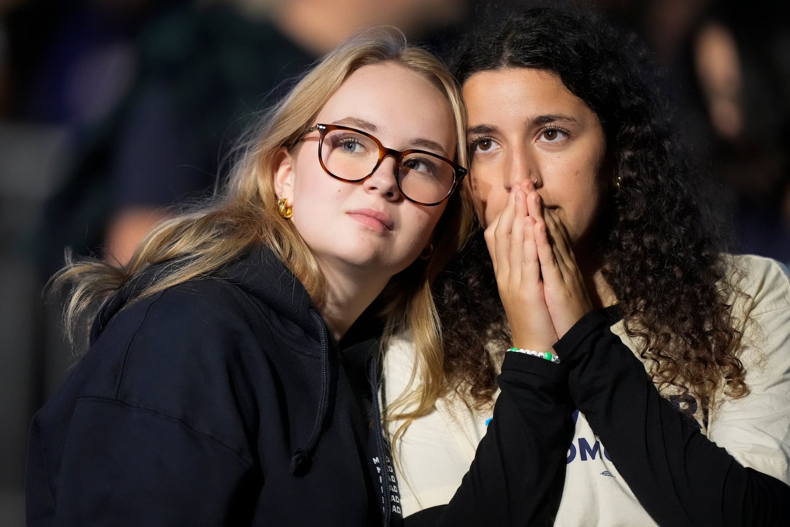 Supporters of Democratic presidential nominee Vice President Kamala Harris react during an election night campaign watch party Tuesday, Nov. 5, 2024, on the campus of Howard University in Washington. (AP Photo/Mark Schiefelbein)