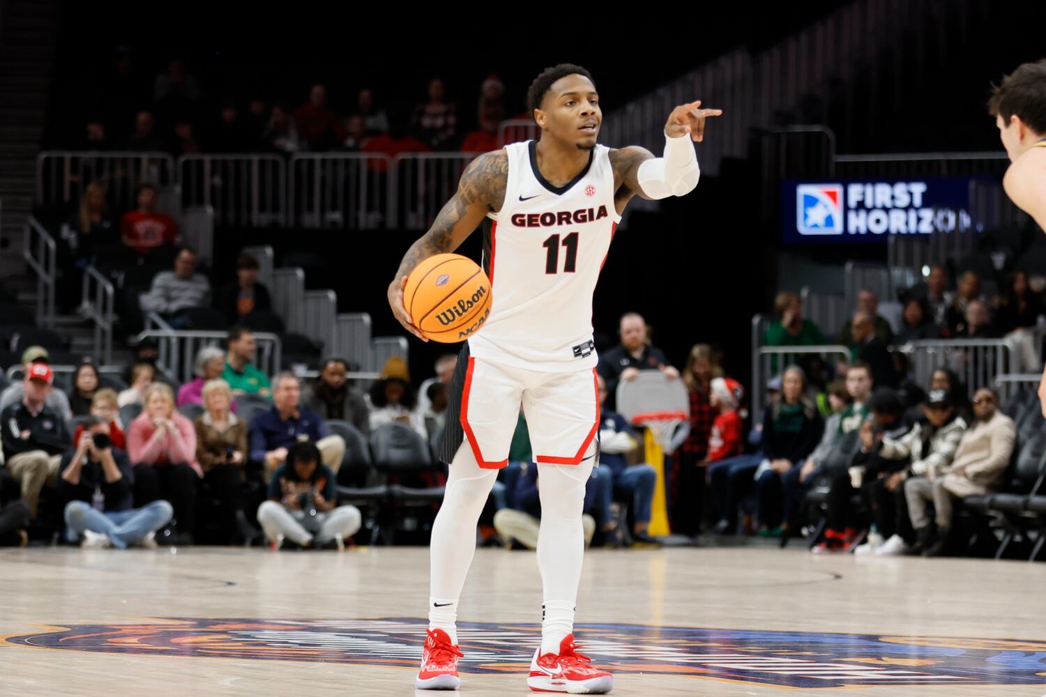 Bulldogs guard Justin Hill calls a play during the second half Sunday night at State Farm Arena. (Miguel Martinez / miguel.martinezjimenez@ajc.com)