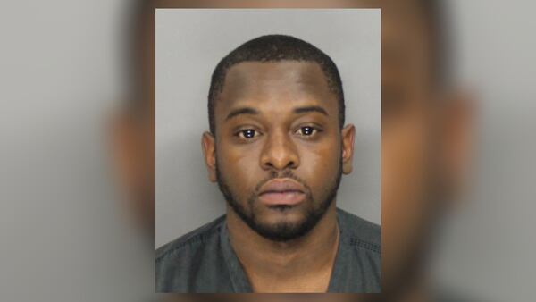 Clarence Mitchell, 28, of Marietta, is accused of shooting another man to death in Cobb County on Wednesday.