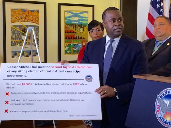 Atlanta Mayor Kasim Reed responds to Ceasar Mitchell. (credit: J. Scott Trubey / AJC)