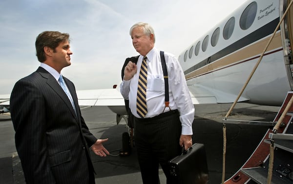 Thomas Malone, right, and his son Adam checking out their company’s jet DeKalb-Peachtree Airport in 2010. Tommy Malone was for years one of Georgia’s top plaintiff’s attorneys, routinely garnering million-dollar verdicts. He succumbed to cancer recently. Jason Getz, jgetz@ajc.com