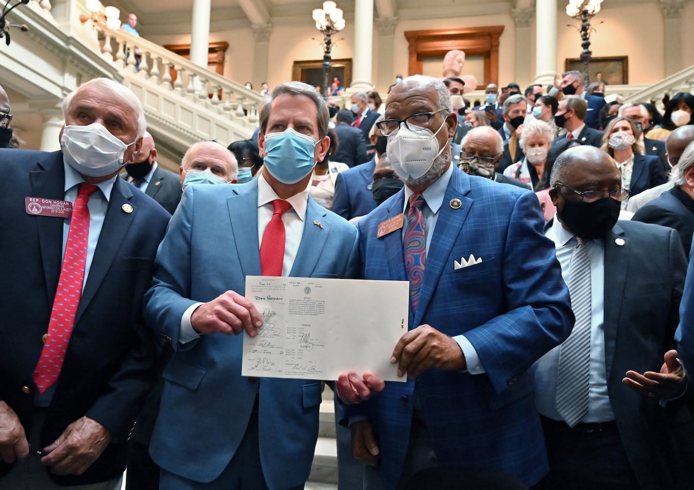 PHOTOS: Gov. Kemp signs hate-crimes bill on last day of legislative session