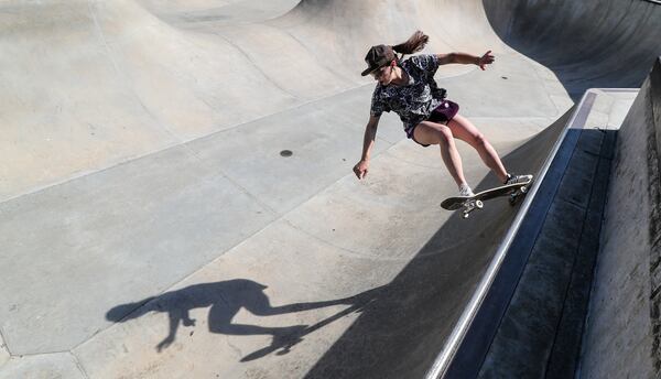 Brooke Lynn Rickman brought her skateboard to the Brook Run Skate Park  in Dunwoody on Thursday to enjoy the sunny day.