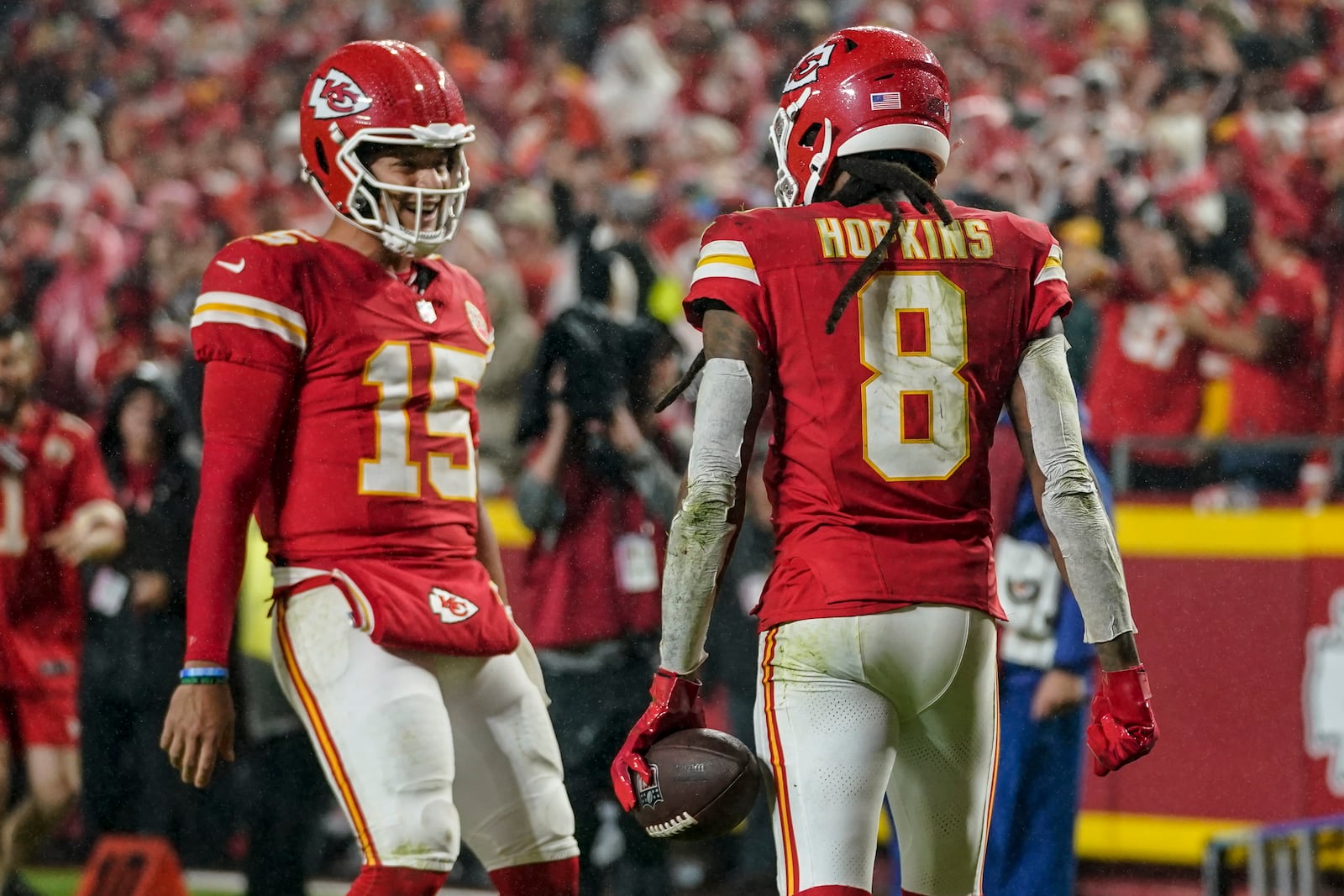 Kansas City Chiefs wide receiver DeAndre Hopkins (8) celebrates his touchdown with quarterback Patrick Mahomes (15) during the second half of an NFL football game against the Tampa Bay Buccaneers, Monday, Nov. 4, 2024, in Kansas City, Mo. (AP Photo/Ed Zurga)