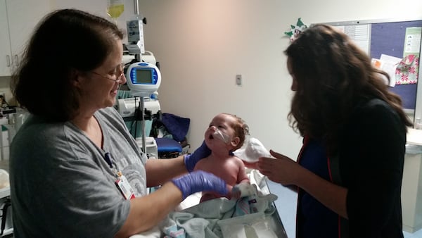 Catherine Reed was 7 days old when she had her first surgery, a procedure to bring her jaw forward to help her breathe, and she’s had so many surgeries since that her parents have lost count. (Courtesy of Mary Reed)