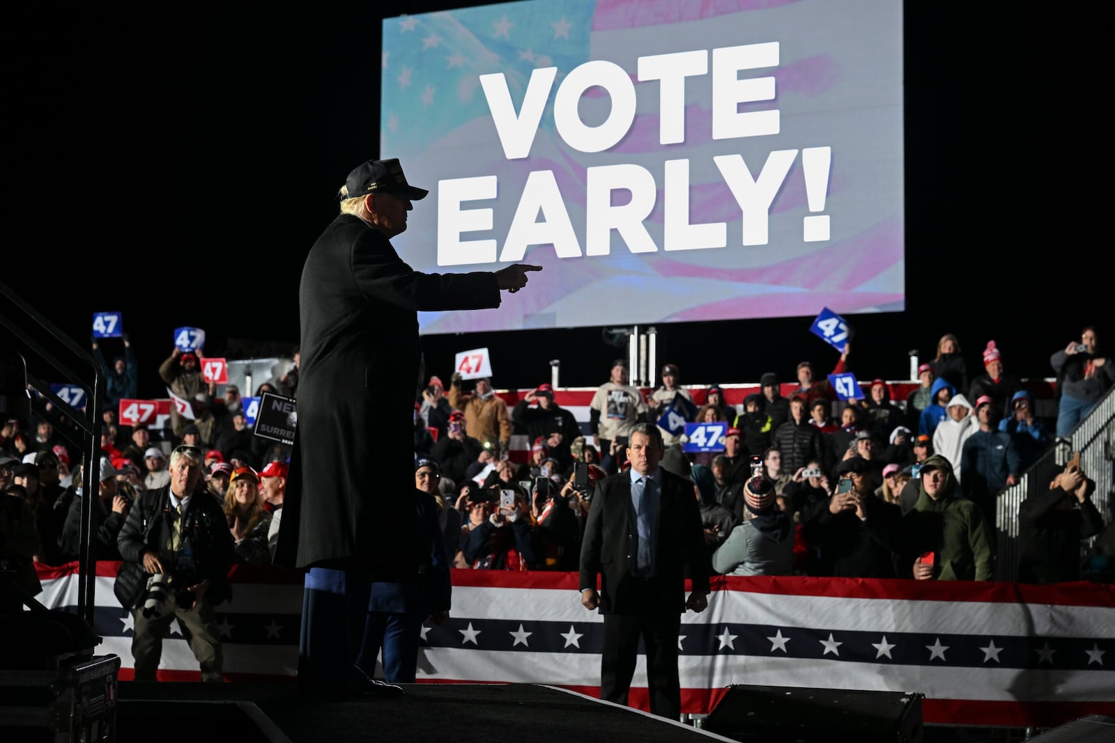 Encouragements to vote early are now commonplace at former President Donald Trump’s rallies, such as this one last week in Traverse City, Mich. (Kenny Holston/New York Times)
                      