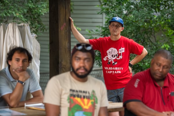 Matthew Nursey (standing), who spent more than a decade working in the food service industry, was among the trainers at a summer heat safety training workshop in Atlanta on July 15. (Ziyu Julian Zhu / AJC)