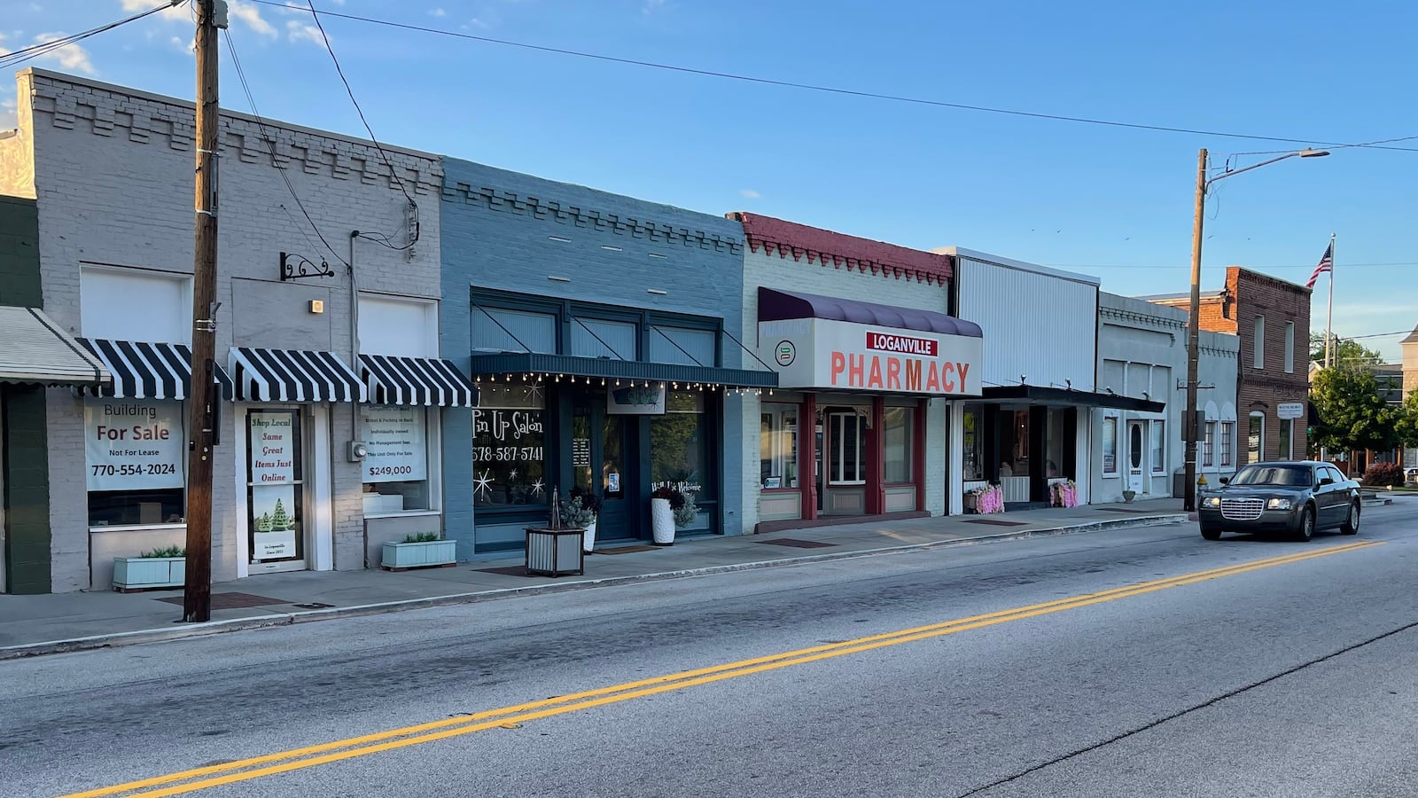 The short downtown strip along Main Street in Loganville has a few shops and plenty of vacant spaces. Officials want to revitalize the downtown area, taking feedback from residents into consideration. (Tyler Wilkins / tyler.wilkins@ajc.com)