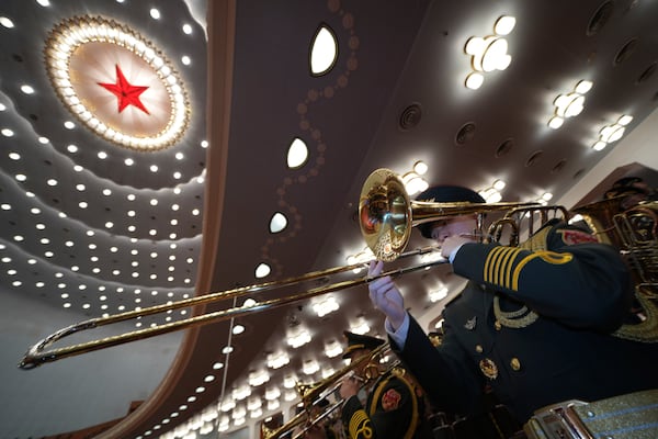 Chinese band members rehearse for the opening of the Chinese People's Political Consultative Conference held at the Great Hall of the People in Beijing, Tuesday, March 4, 2025. (AP Photo/Ng Han Guan)