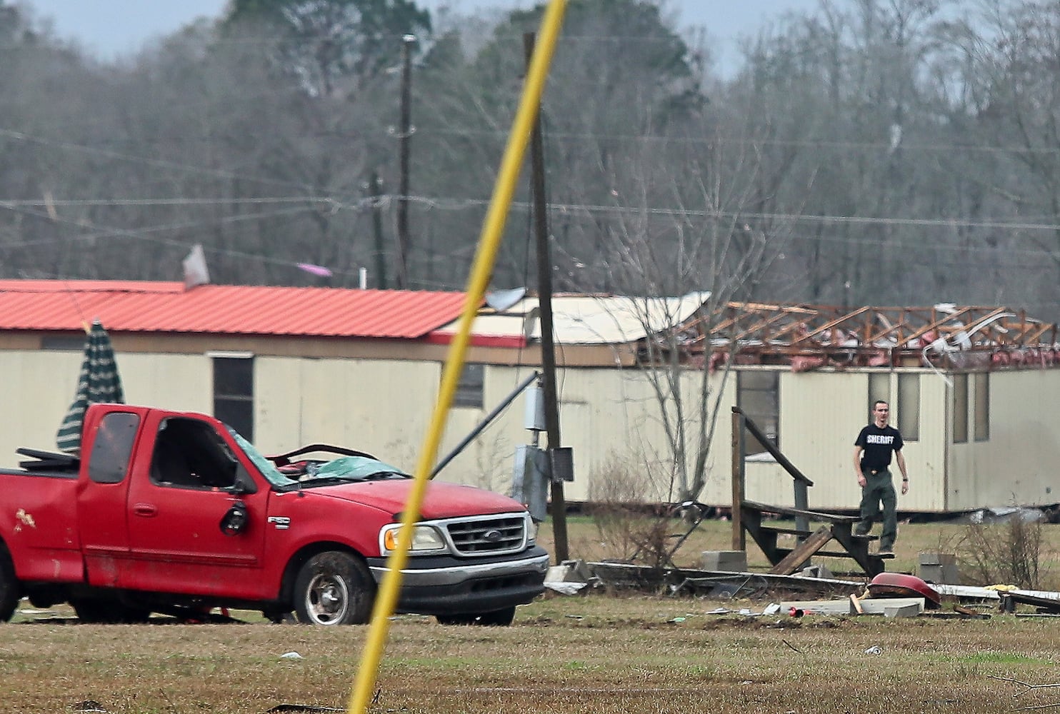 18 die amid apparent winter tornadoes, other storms in South