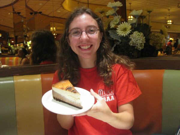 Olivia King, writer Bill King’s daughter, gets ready to enjoy a slice of Junior’s celebrated cheesecake at the restaurant in Brooklyn, N.Y. CONTRIBUTED BY BILL KING