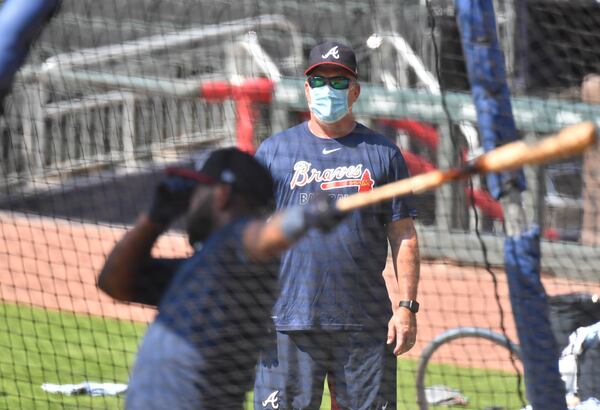 Braves hitting coach Kevin Seitzer wears a mask while watching batting practice on Saturday, July 4, 2020. (Hyosub Shin / Hyosub.Shin@ajc.com)