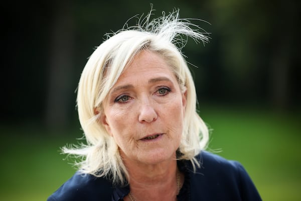 FILE - French far-right leader Marine Le Pen answers reporters at the Elysee Palace after a meeting with French President Emmanuel Macron, Aug. 26, 2024 in Paris. (AP Photo/Thomas Padilla, File)