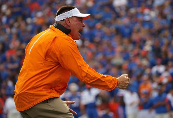 GAINESVILLE, FL - SEPTEMBER 26: Head coach Butch Jones of the Tennessee Volunteers cheers during a game against the Florida Gators at Ben Hill Griffin Stadium on September 26, 2015 in Gainesville, Florida. (Photo by Mike Ehrmann/Getty Images)