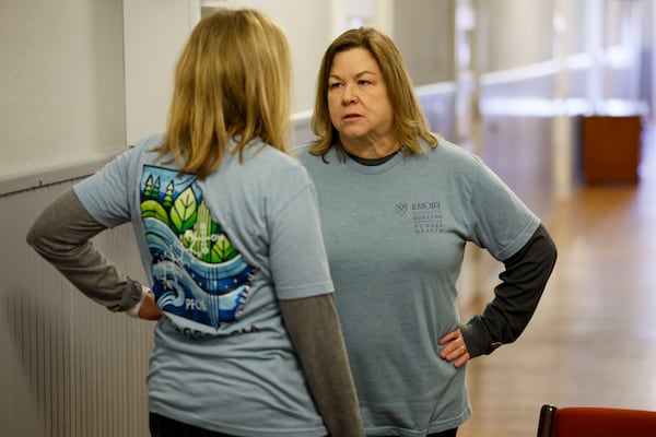 Researchers from Emory University’s Rollins School of Public Health, Melanie Pearson and Dana Barr, right, speak as they work conducting blood screenings for Rome residents on Sunday, Feb. 2, 2025
(Miguel Martinez/ AJC)