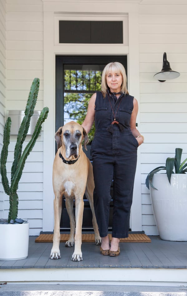 Alison Michaels-Fandel, with her Great Dane, Francis, bought the Grant Park home in 2017 with her husband, Derek Fandel. She is a real estate agent and founder of Shoppe Native, an in-home, invitation-only event of locally curated goods and art.