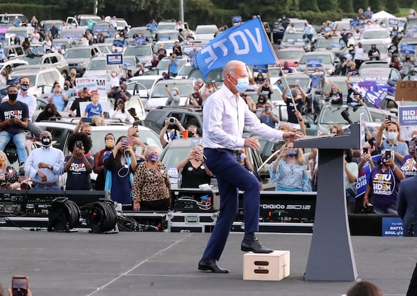 With the backing of two new U.S. senators from Georgia, President Joe Biden signed into law a $1.9 trillion coronavirus relief act and a $1.2 trillion infrastructure package. Curtis Compton / Curtis.Compton@ajc.com