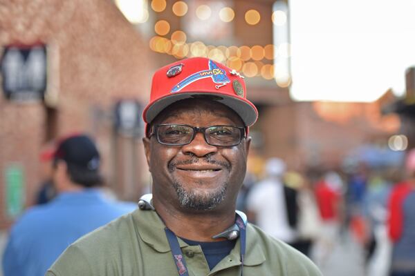 Darnell Wood, shown smiling before the Sept. 7 Atlanta Braves home game against the Miami Marlins at SunTrust Park, has turned his life around in the past year, with help from First Step Staffing and the Braves. HYOSUB SHIN / HSHIN@AJC.COM