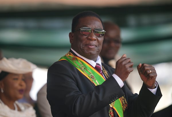 FILE - Zimbabwe President Emmerson Mnangagwa gestures during his inauguration ceremony at the National Sports Stadium in the capital, Harare, on Sept. 4 2023. (AP Photo /Tsvangirayi Mukwazhi, File)