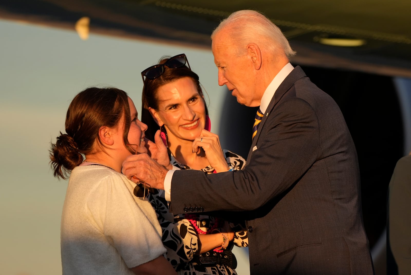 President Joe Biden greets people as he arrives at Phoenix Sky Harbor International Airport, Thursday, Oct. 24, 2024 in Phoenix. (AP Photo/Manuel Balce Ceneta)