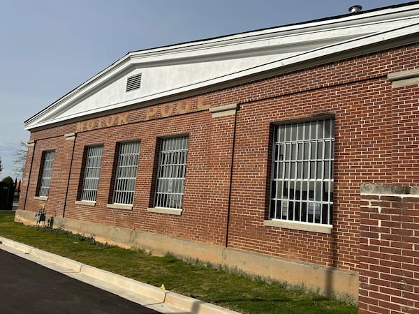 BlueStar Studios includes existing buildings from the time it was the Army post Fort Gillem, including this automotive garage. (Rodney Ho/AJC)