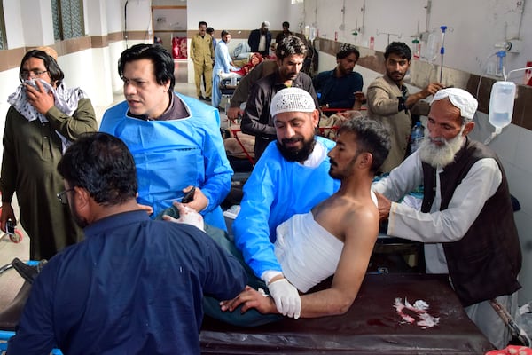 Injured victims of bomb explosion at railway station, are treated at a hospital, in Quetta, southwestern Pakistan, Saturday, Nov. 9, 2024. (AP Photo/Arshad Butt)