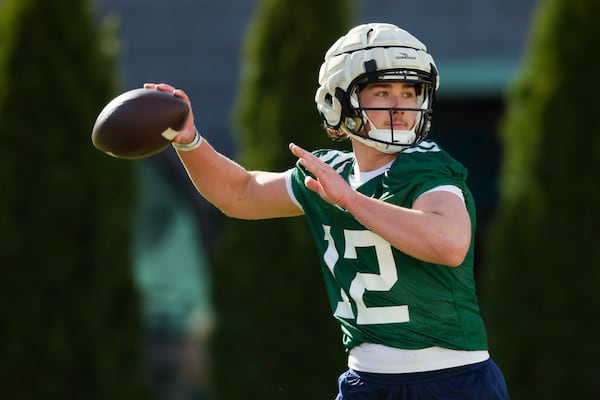 Georgia Tech quarterback Aaron Philo (12) attempts a pass during their first day of spring football practice at Rose Bowl Field, Monday, March 11, 2024, in Atlanta. (Jason Getz / jason.getz@ajc.com)