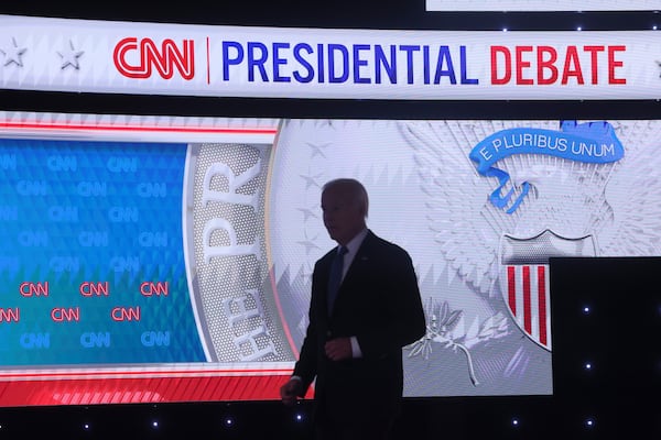 President Joe Biden walks back on stage after a commercial break debating President Joe Biden at CNN, Thursday, June 27, 2024, in Atlanta. (Jason Getz / AJC)
