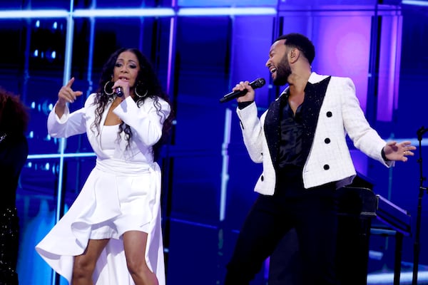 John Legend and Sheila E.  perform at the Democratic National Convention in Chicago on Wednesday.