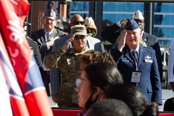 The flag is saluted during the 40th annual Georgia Veterans Day Parade at The Battery outside Truist Park on Saturday, November 6, 2021. (Photo: Steve Schaefer for The Atlanta Journal-Constitution)