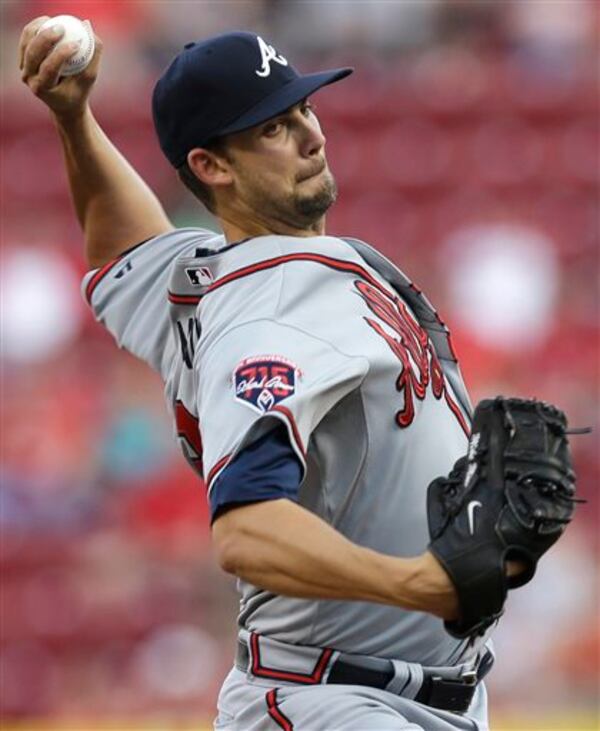 Atlanta Braves starting pitcher Mike Minor throws against the Cincinnati Reds in the first inning of a baseball game, Friday, Aug. 22, 2014, in Cincinnati. (AP Photo/Al Behrman) Mike Minor took a no-hitter into the eighth inning last week at Cincinnati. He'll try to end the Braves' road trip on a strong note against the Mets Thursday.