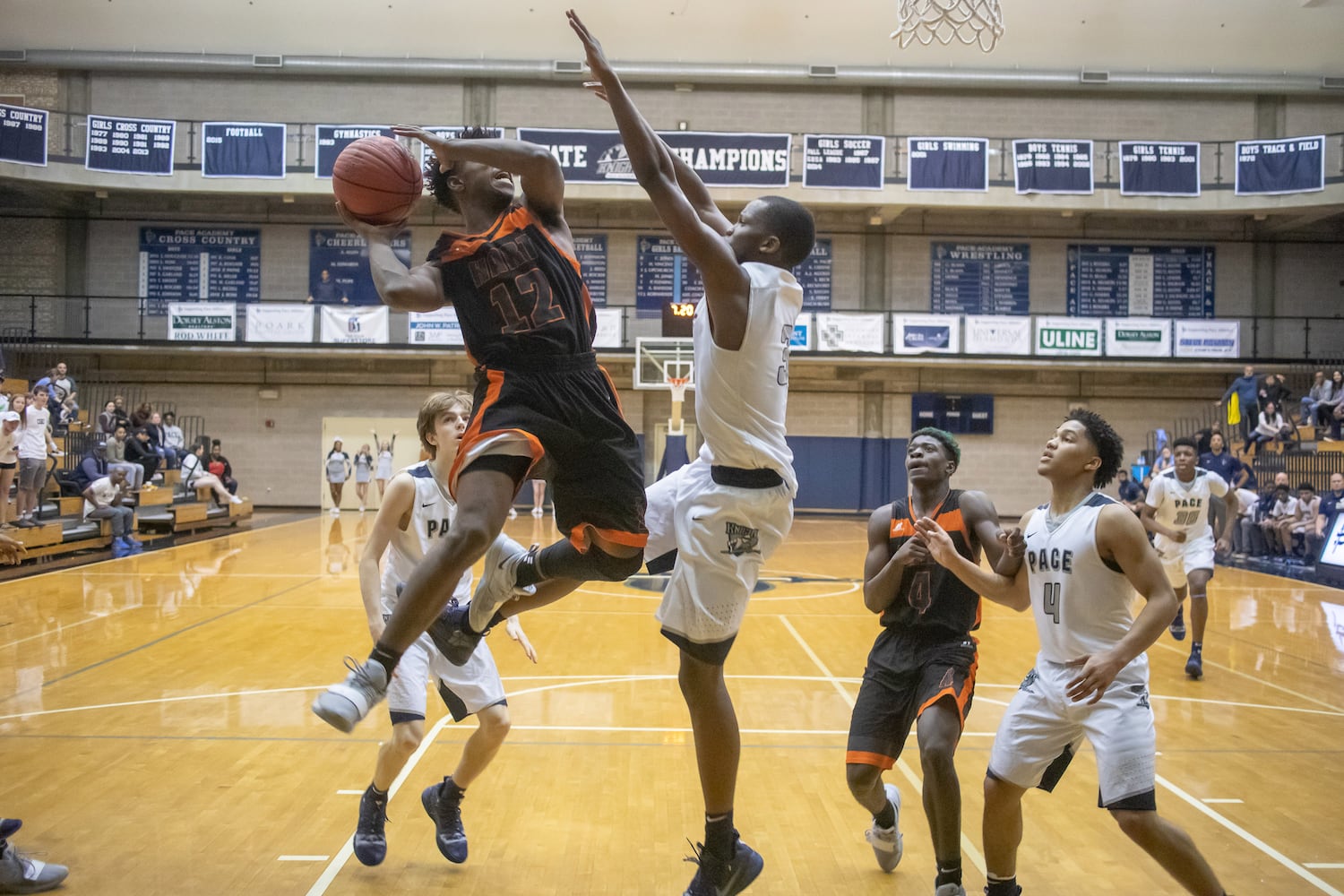 Photos: High school basketball state tournament tips off