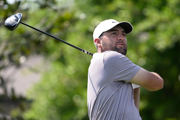 Scottie Scheffler tees off on the first hole during the final round of the Arnold Palmer Invitational at Bay Hill golf tournament, Sunday, March 9, 2025, in Orlando, Fla. (AP Photo/Phelan M. Ebenhack)