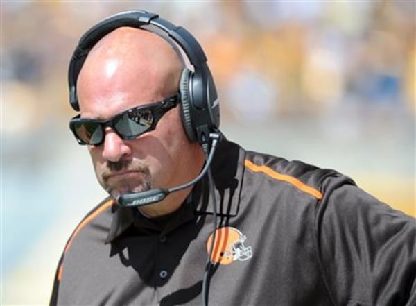 Mike Pettine walks the sideline in the second quarter of an NFL football game against the Pittsburgh Steelers, Sunday, Sept. 7, 2014, in Pittsburgh. (Associated Press)