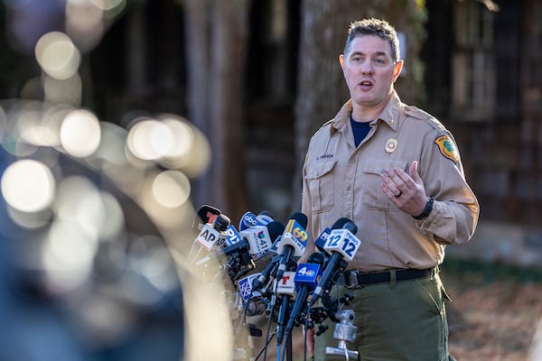 Assistant Division Fire Warden Chris Franek speaks to reporters during a briefing at the New Jersey Forest Fire Service Command Post, Monday, Nov. 11, 2024, in Ringwood, N.J. (AP Photo/Stefan Jeremiah)