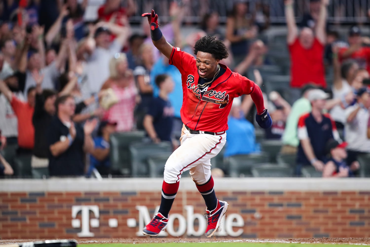 Photos: Braves celebrate after outlasting the Nationals