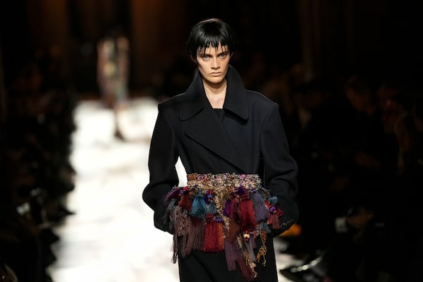 A model wears a creation as part of the Dries Van Noten Fall/Winter 2025-2026 Womenswear collection presented in Paris, Wednesday, March 5, 2025. (Photo by Scott A Garfitt/Invision/AP)